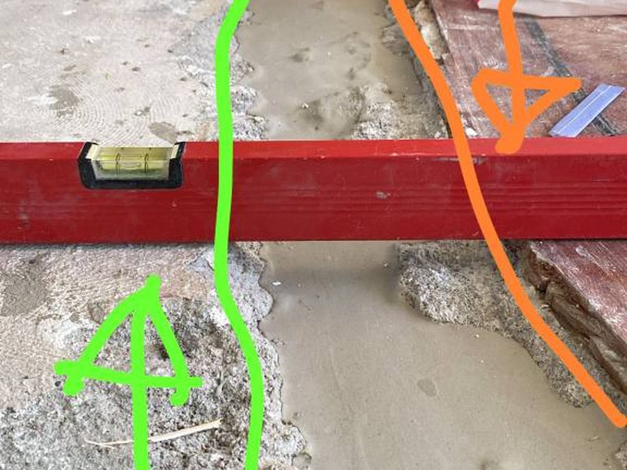 De ondervloer wordt met een rei op hoogte gecontroleerd